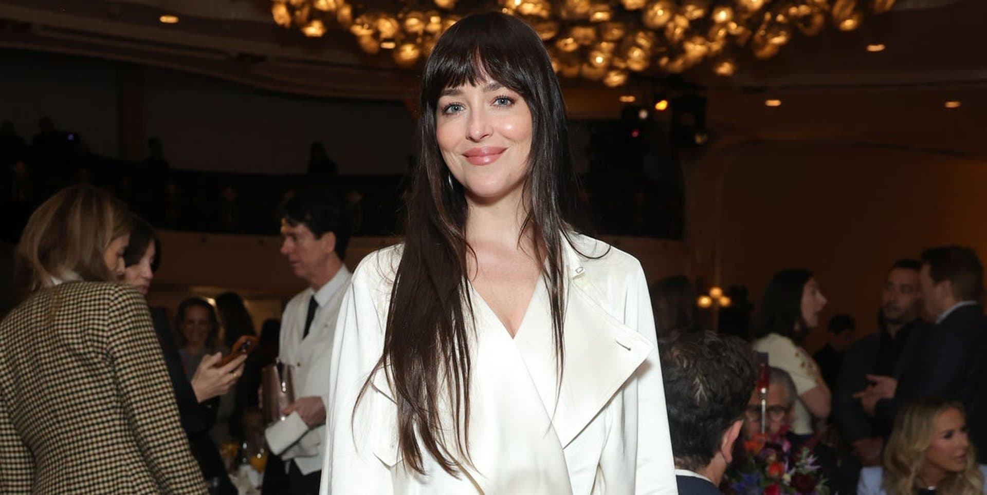 Dakota Johnson Gives Pajama Dressing a Spin With a Silk Robe Coat